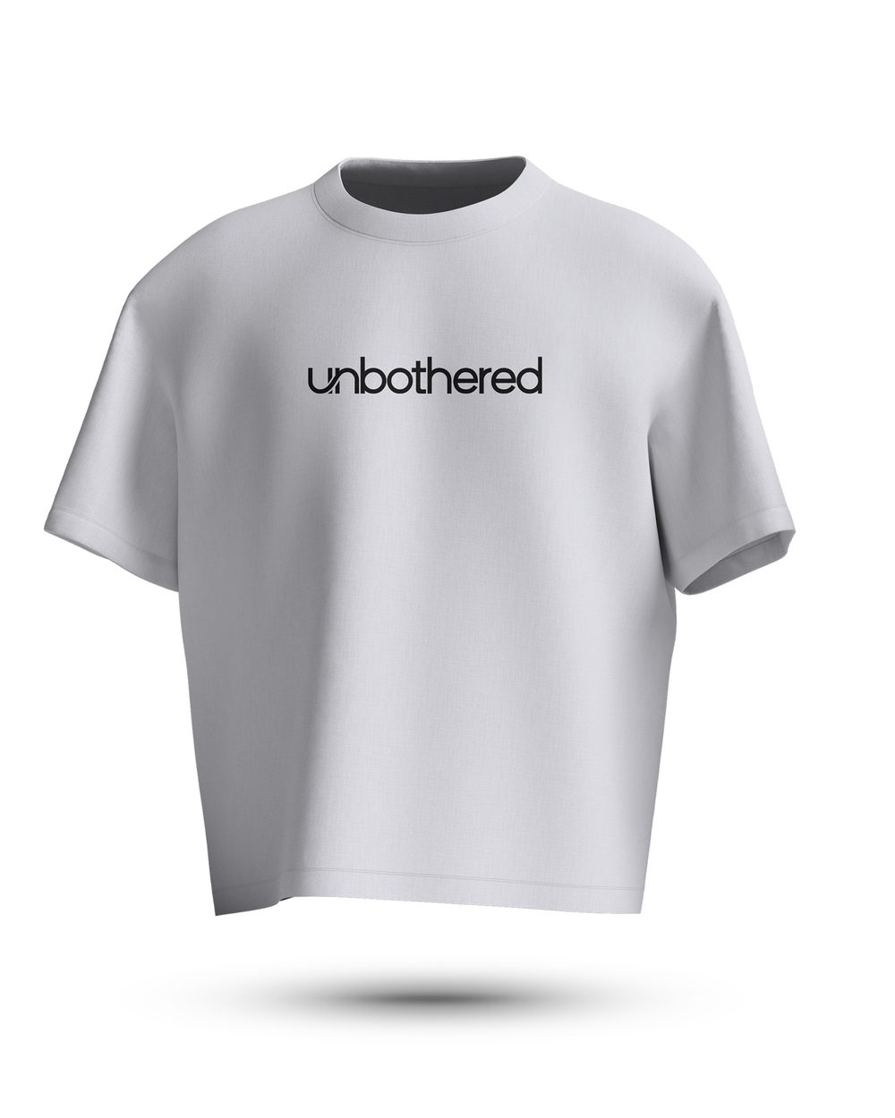 White Unbothered oversized tee, front: “unbothered” wordmark across the chest